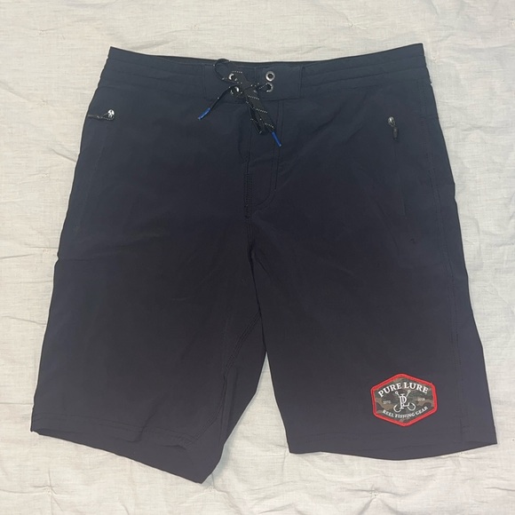 Lightly used black RFG quick dry board shorts. Size 30. - Picture 1 of 3